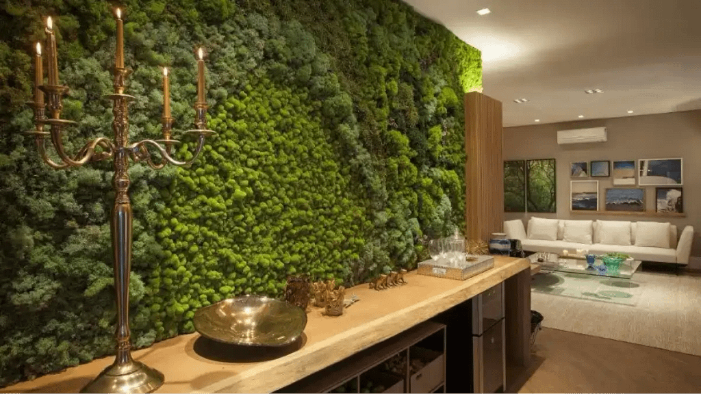 Uma parede verde na sala da casa. Blog Conversa Pronta.